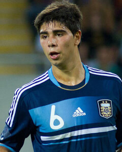 Lautaro Gianetti of Argentina's Velez Sarsfield, top, heads the