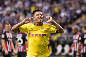 United vai atrs de prodgios Sancho e Haland